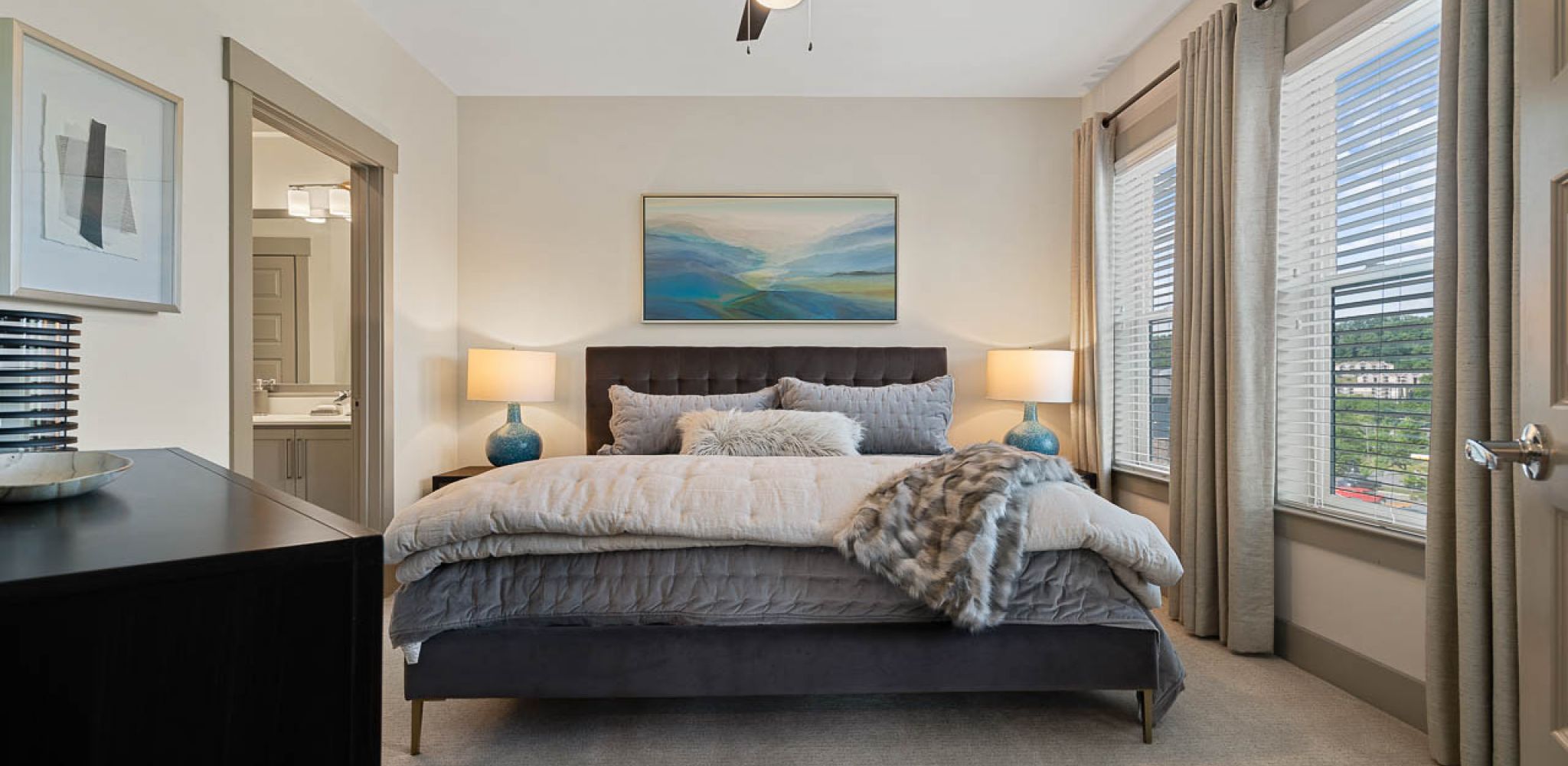 Hawthorne at Mills Gap spacious apartment bedroom furnished with large bed and large windows